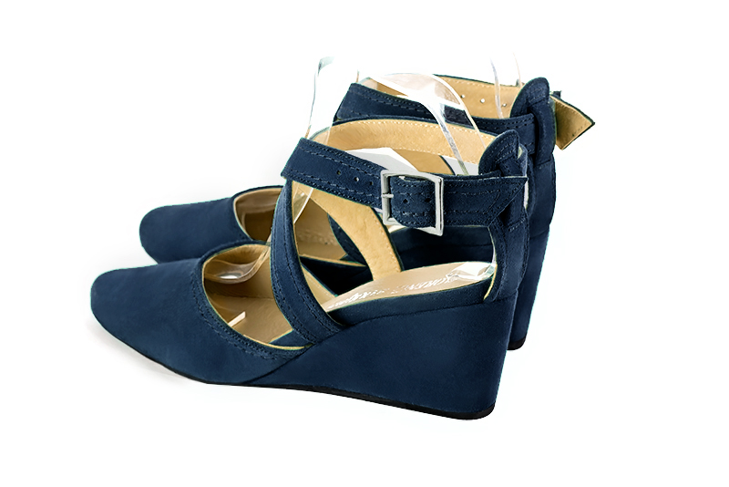 Navy blue women's open back shoes, with crossed straps. Round toe. Medium wedge heels. Rear view - Florence KOOIJMAN